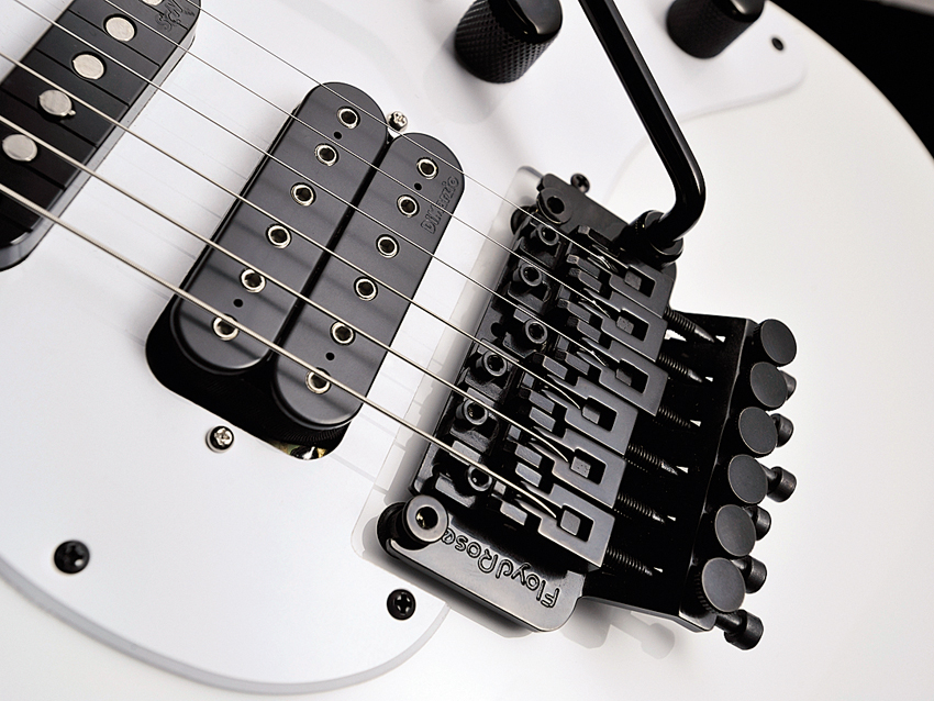 A classic DiMarzio Super Distortion is fitted in the bridge