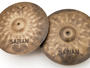 The rough-hewn finish brings a dark, intense tonality to the hats' sound
