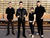 Frontman James Allan (second left) talks in depth to MusicRadar