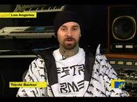 Travis Barker back behind his drumkit